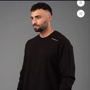 Barley worn Youngla Sweater.